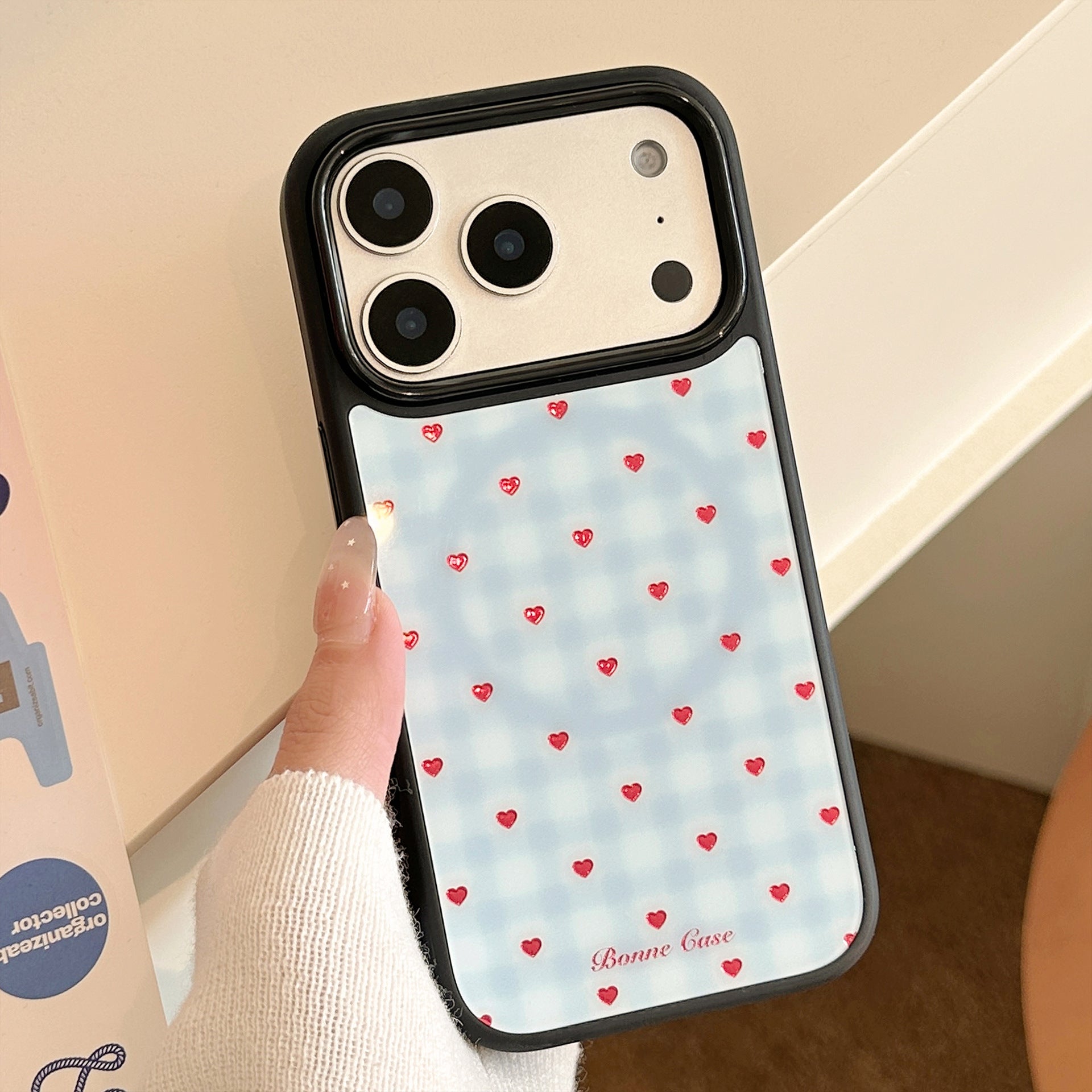 Clapet de téléphone à aspiration magnétique au cœur en treillis bleu doré