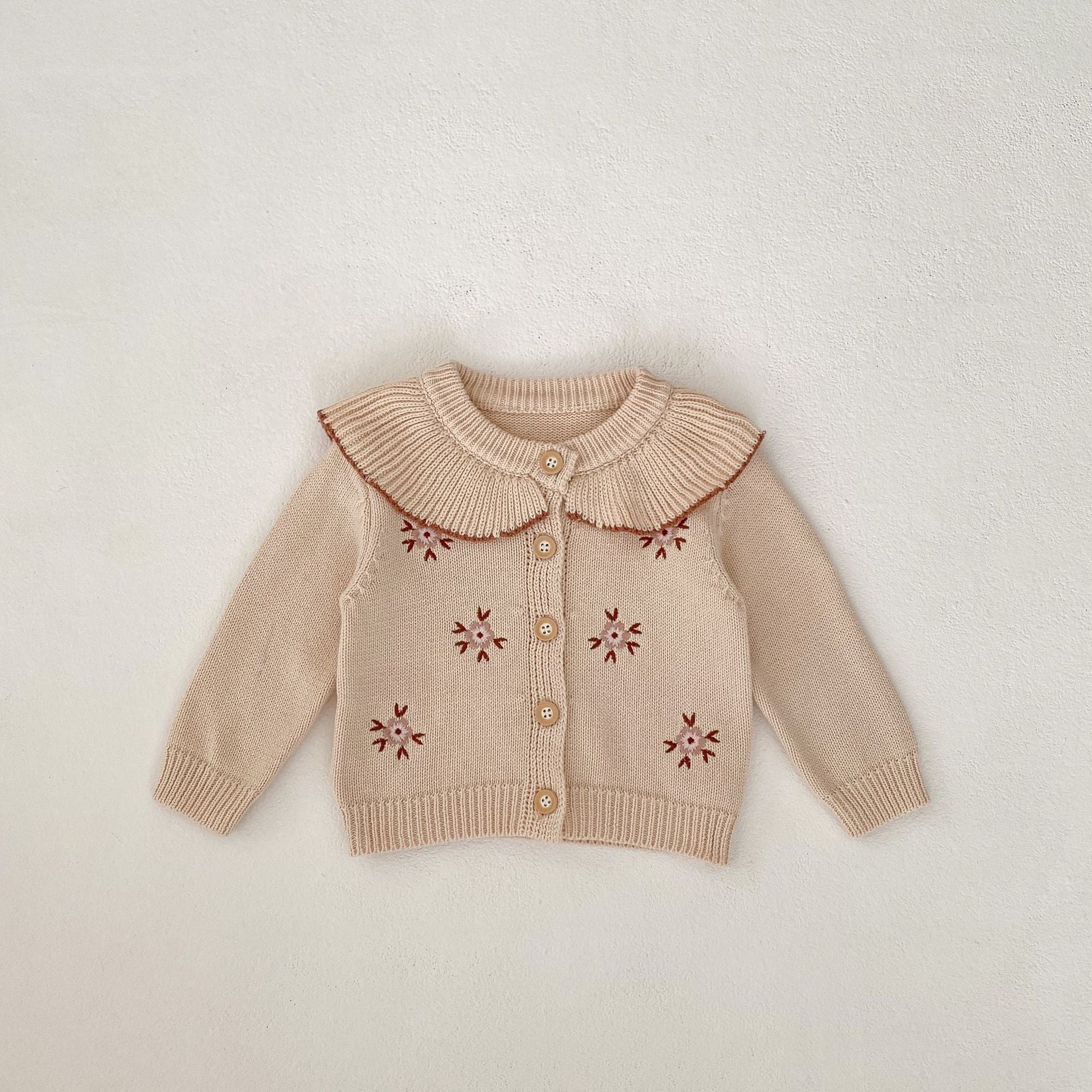 Manteau en tricot brodé pour bébé