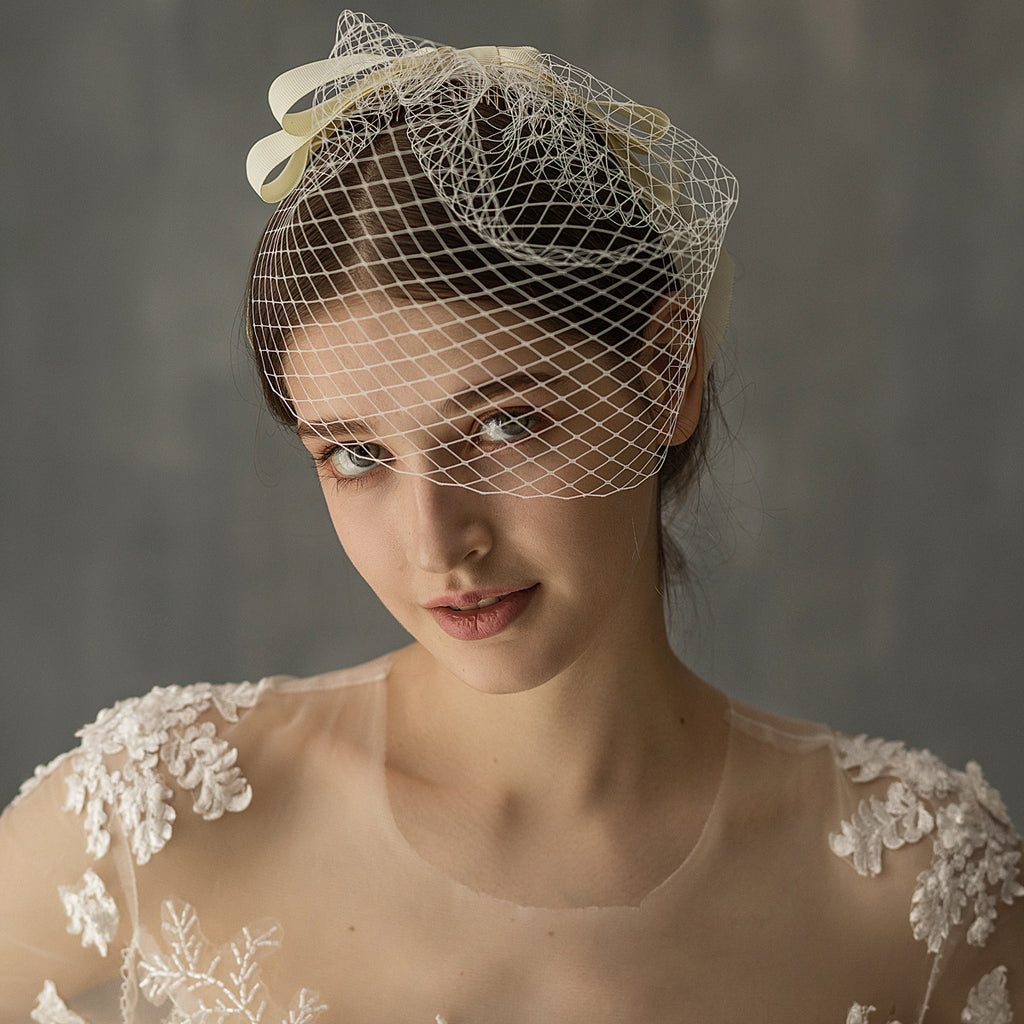 L'Europe et l'Amérique Blanc Mesh Bow Veil
