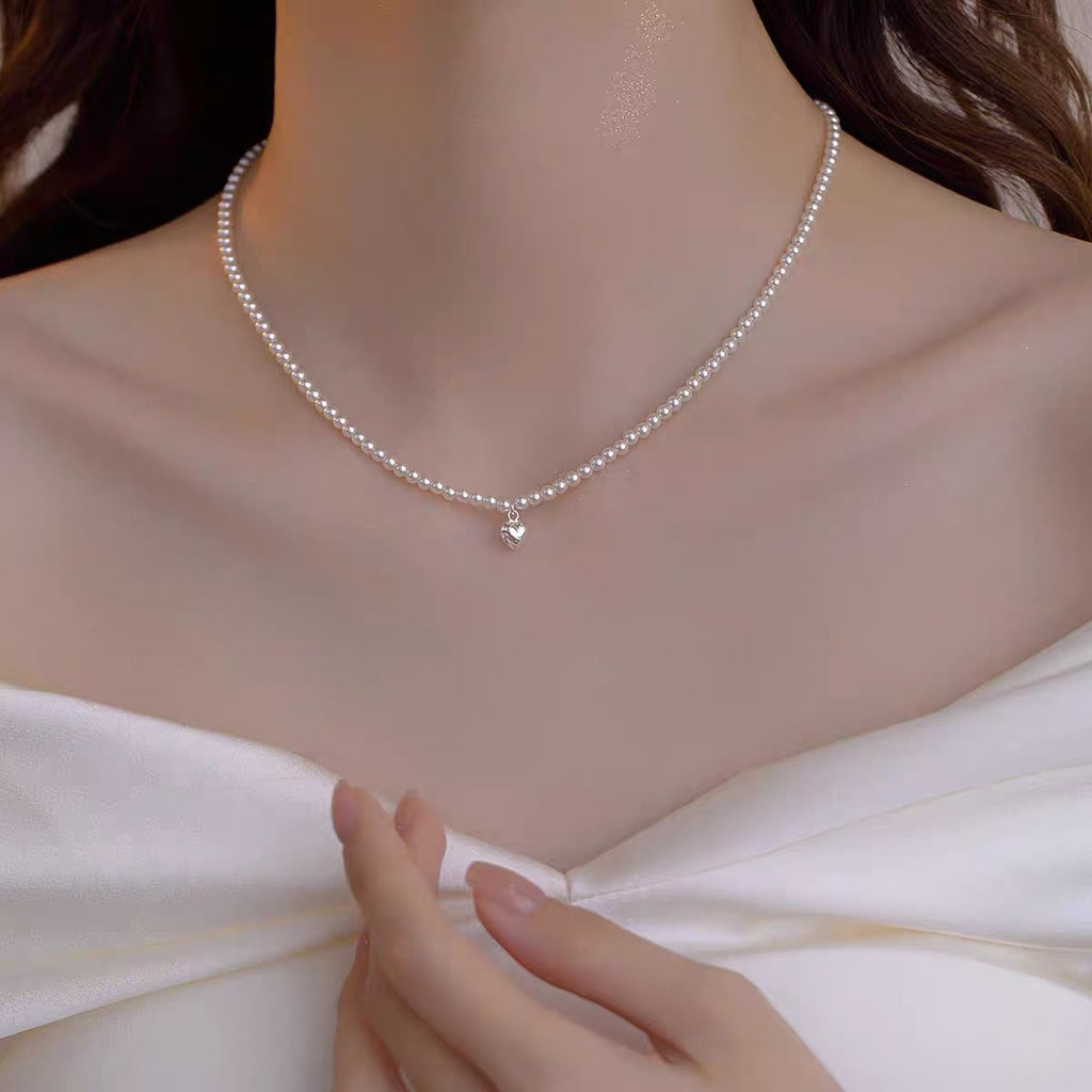 Femmes Mode Faux Perle Collier Chaîne Niche Design de luxe Élégant collier de sweater pour