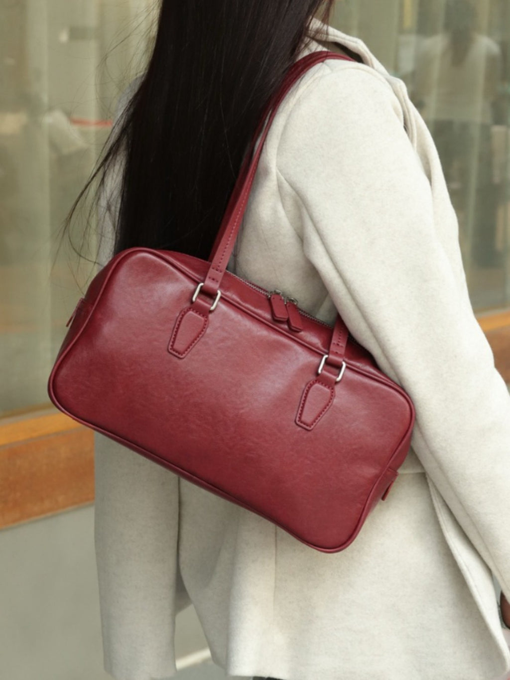 Couche de tête Cowhide sac pour femmes Armpit sac de bowling sac sac de fourre-tout Niche main en cuir haut de gamme