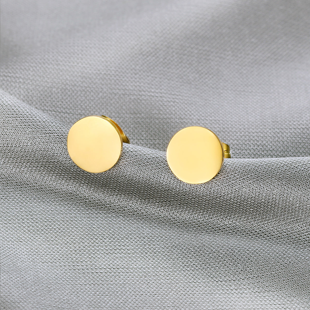 Boucles d'oreilles élégantes et élégantes en acier au titane