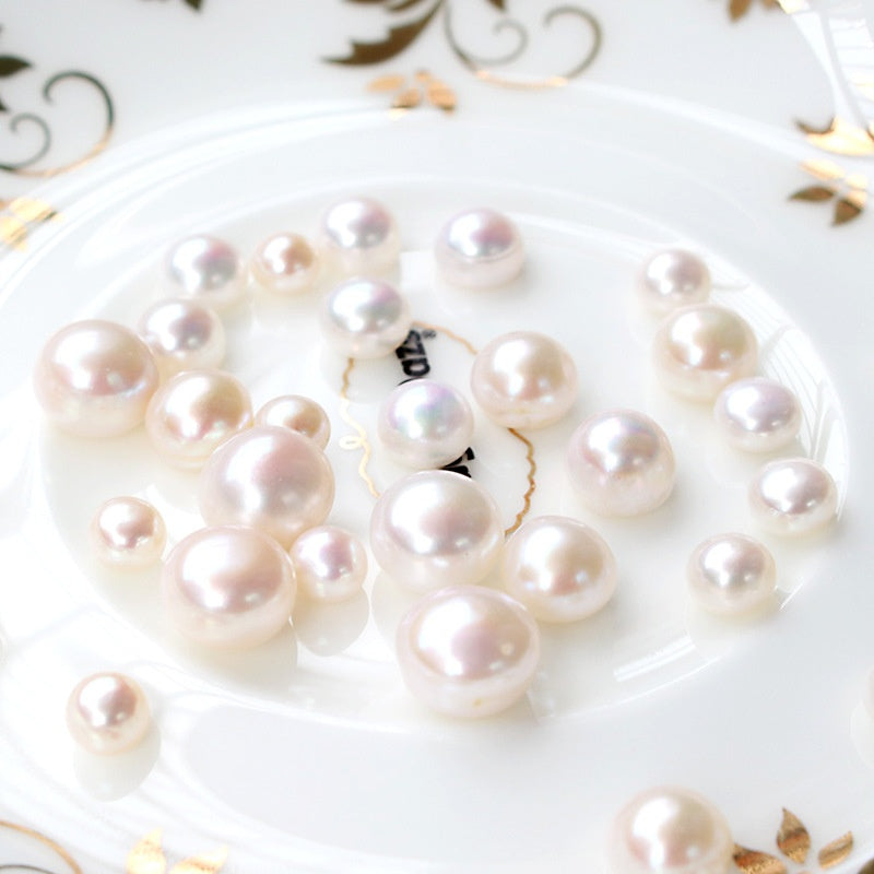 Perles blanches plates rondes en eau douce naturelle de couleur Aurora