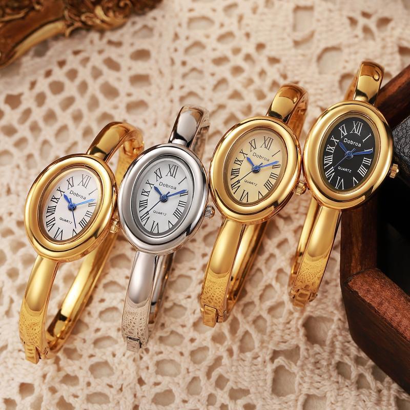 Montre femme ovale Niche légère-luxe avec une lunette diamant or rose