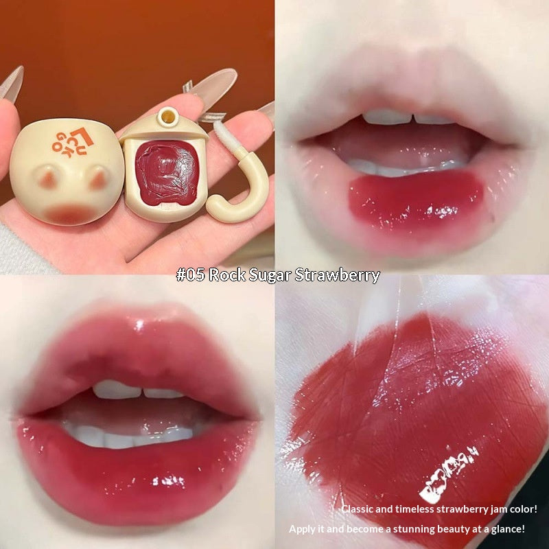 Orange Cat Lip Glaze Sheer et jeune avec une finition miroir comme Dewy