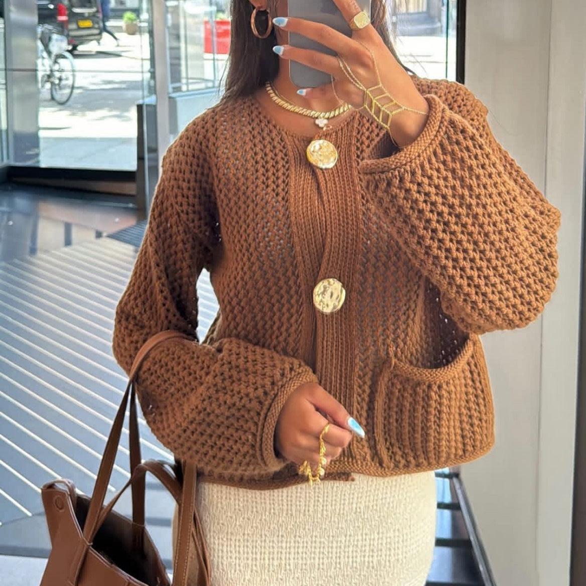 Veste à col rond à manches simples avec deux poches pour femmes
