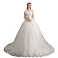 Robe de mariée Trailing Deep V Col Dentelle Haute Robe de mariée à manches longues