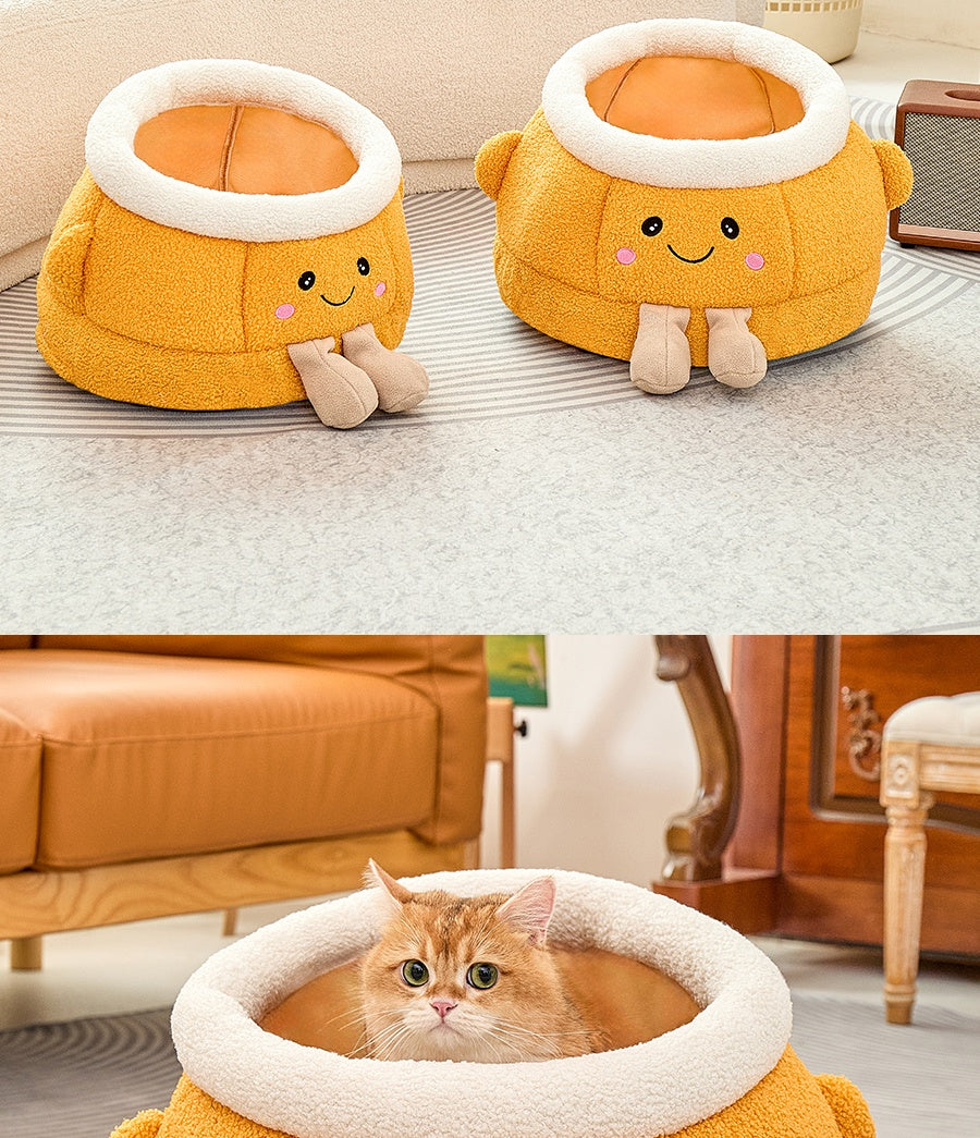Lit de chat avec sourire orange