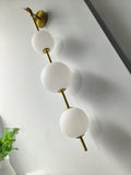 Lampe murale côté lit - Lampe perle