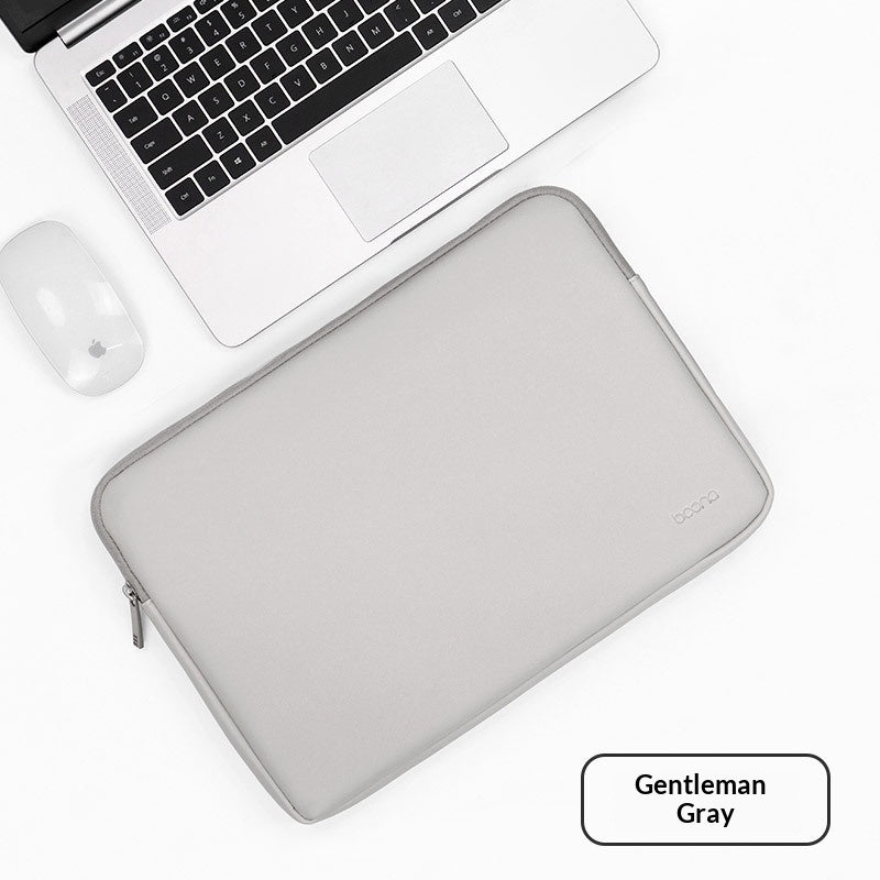 Internal leather laptop sleeve included
