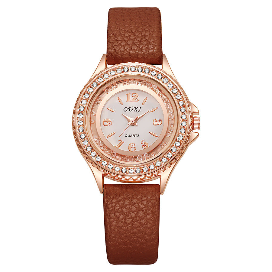 Élégante et minimaliste montre féminine ronde en strass
