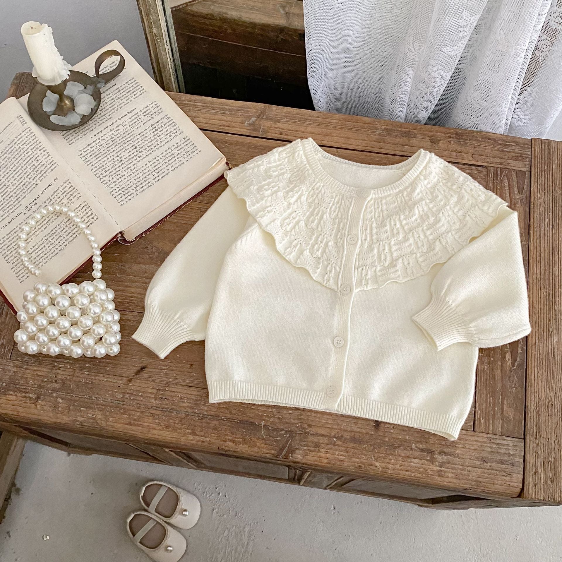 Manteau tricoté pour bébé