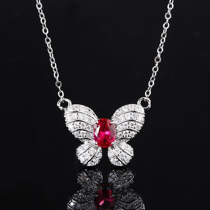 Boucles d'oreilles rubis tendance papillon collier et bague