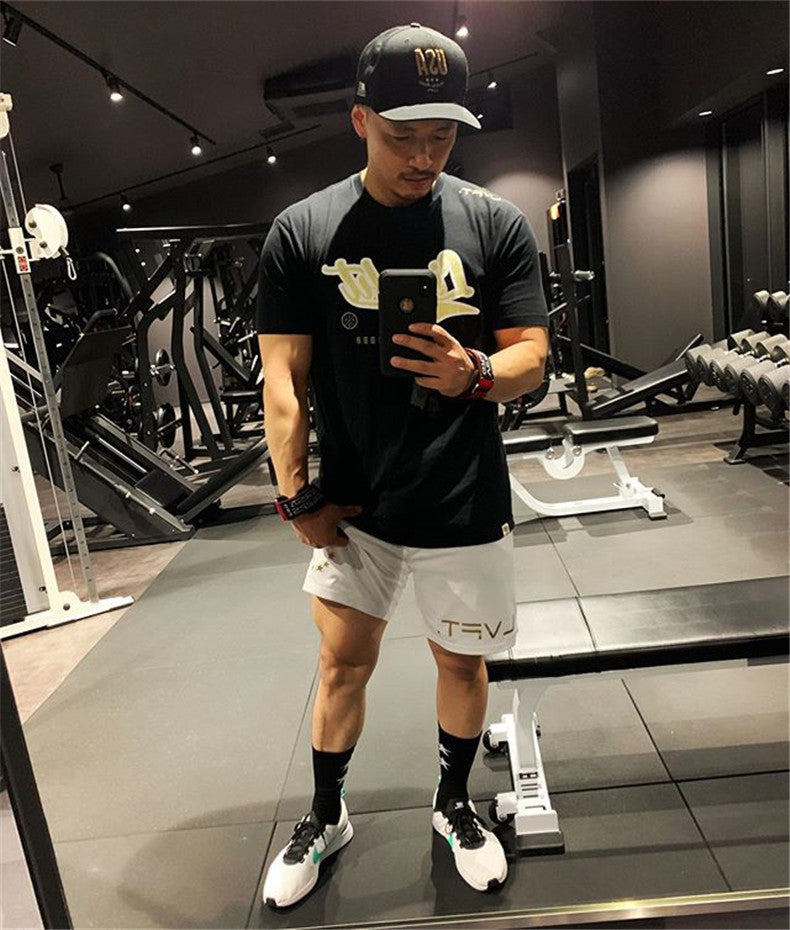 Sports musculo-fitness Mesh rapide pour hommes Quart d'entraînement de course Breathable Short