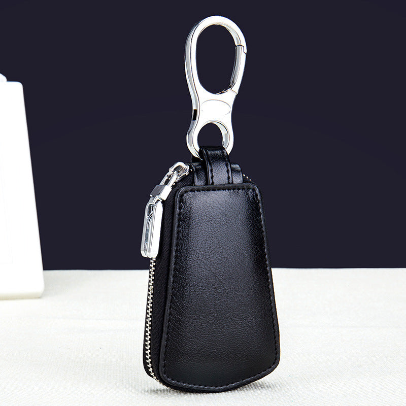 Boîtier en cuir avec ceinture zippée
