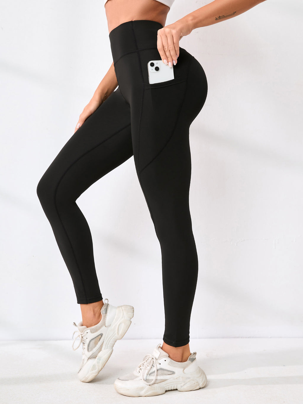 Pantalon de yoga européen et américain Couleur solide Splicing Hip-Lifting Pocket Outd