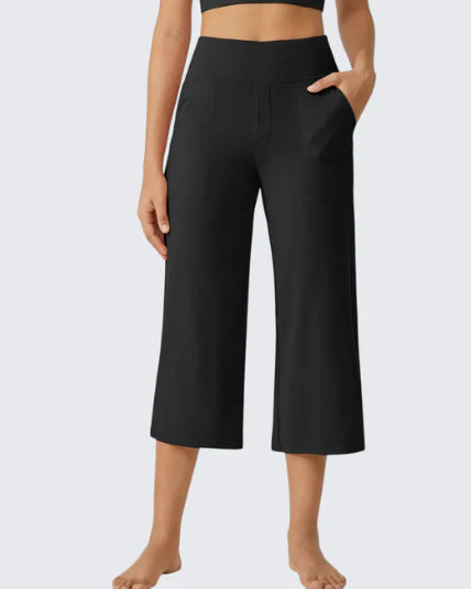 Les femmes haute taille emportent droit pantalons de yoga occasionnels avec des poches