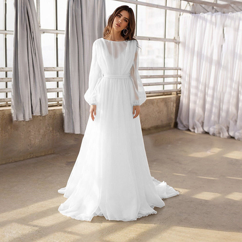 Robe de mariée à manches longues de style français avec une taille ajustée