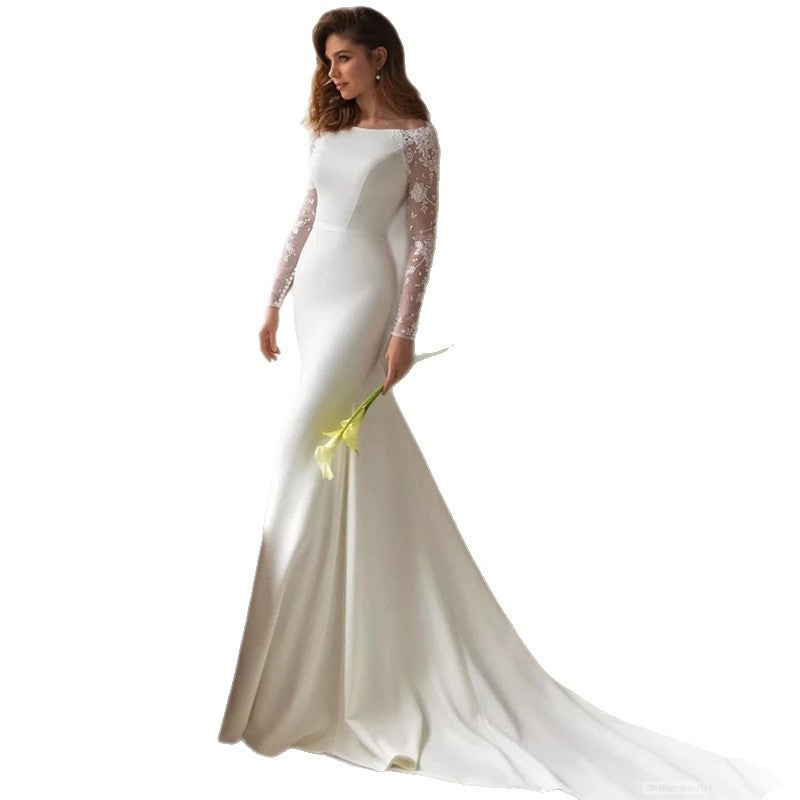 Robe de mariée en dentelle satinée à manches longues