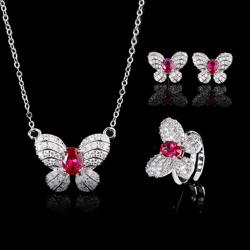 Boucles d'oreilles rubis tendance papillon collier et bague