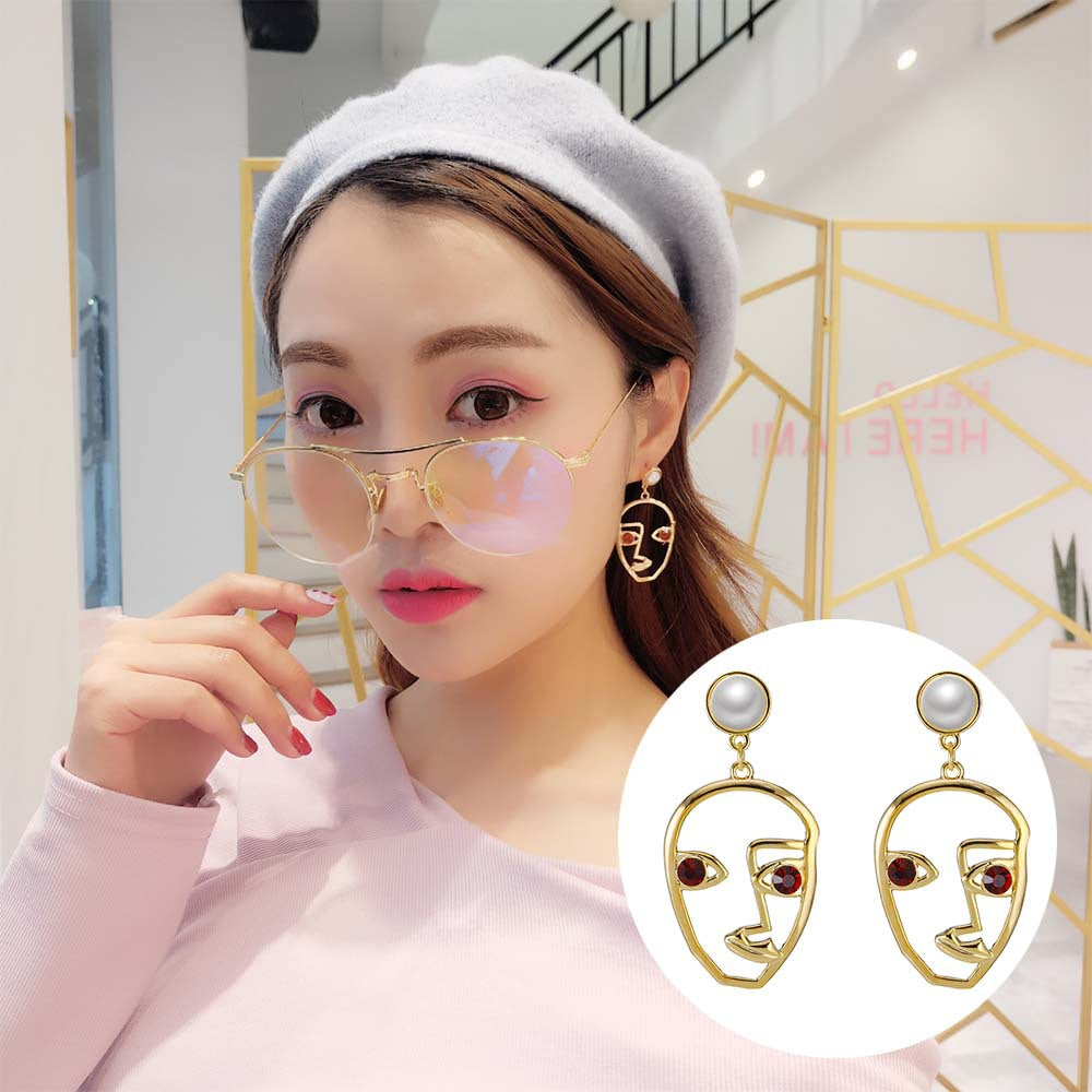 Boucles d'oreilles en perles de la personnalité du visage coréen