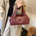 Sac à main retro en cuir souple avec un simple