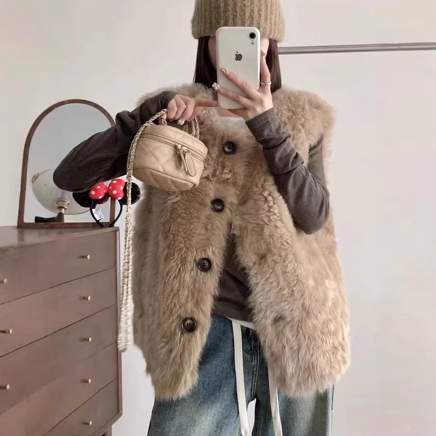 Veste en cuir et en fourrure mi-longueur
