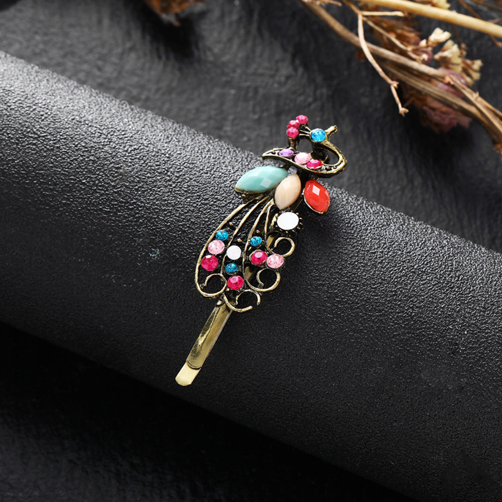 Clip à cheveux vintage en strass couleur paon