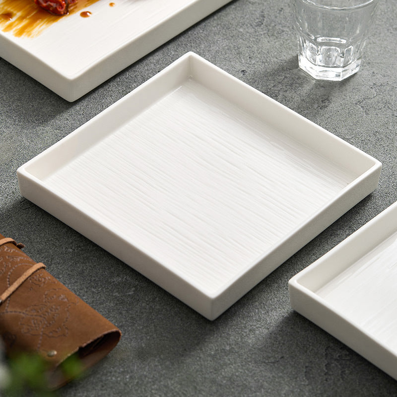 Assiette de vaisselle en plaques carrées