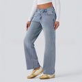 Jeans asymétriques à bouton-volant