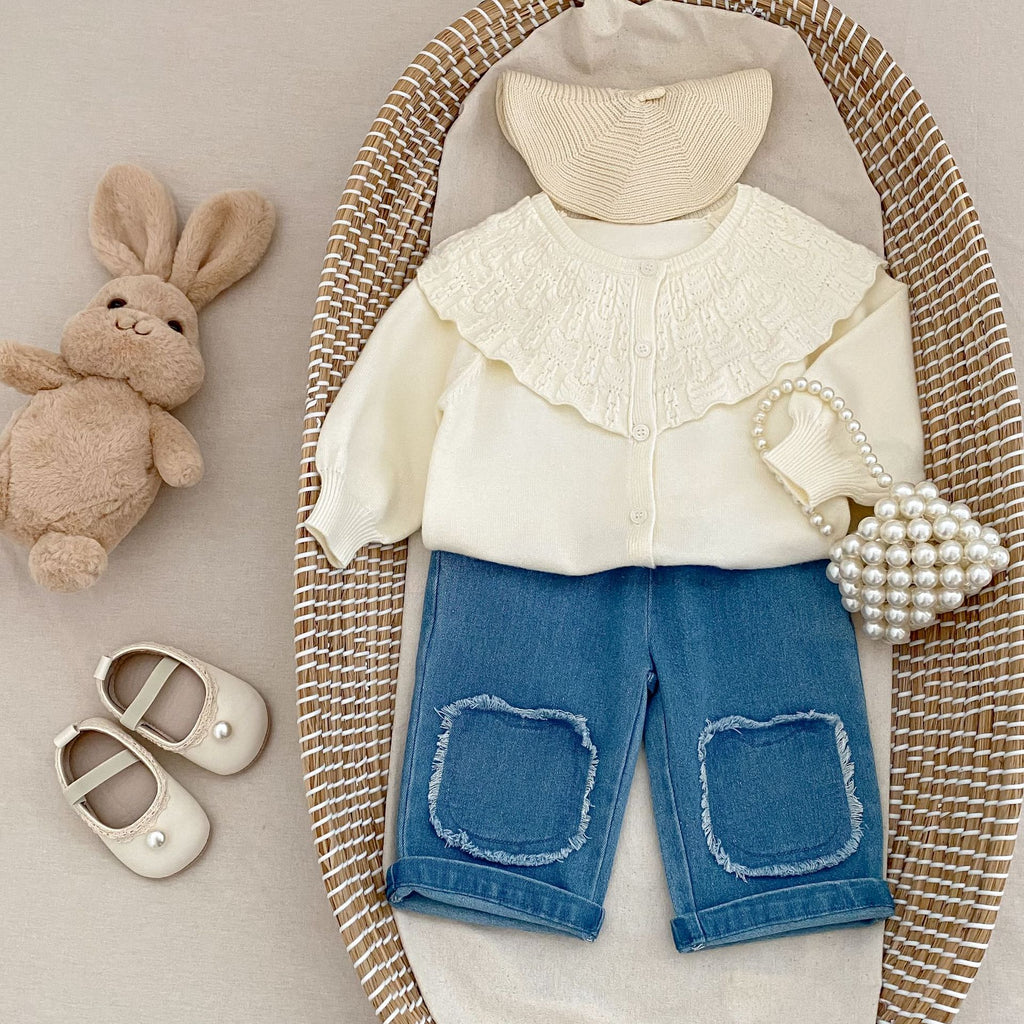 Manteau tricoté pour bébé