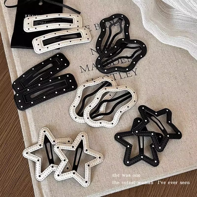 Black and white five-point star leather clip