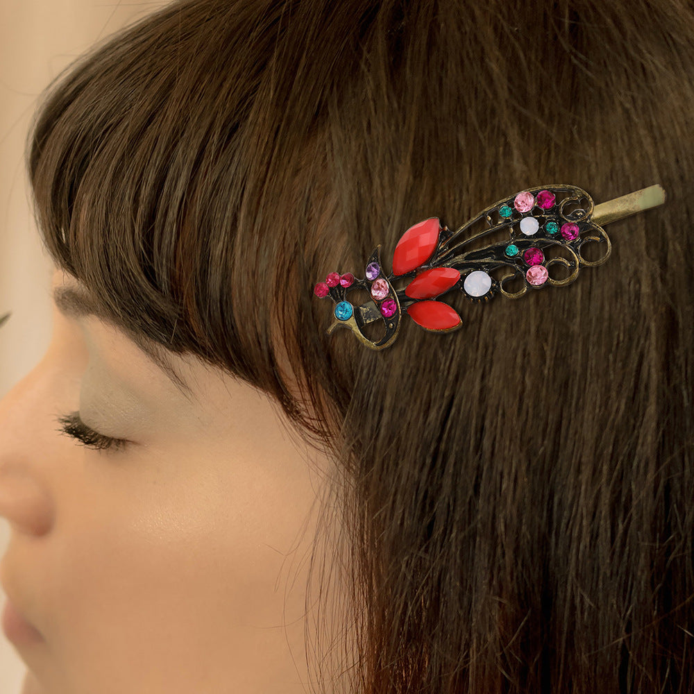 Clip à cheveux vintage en strass couleur paon