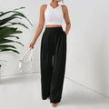 Élégant pantalon à large jambe avec un drap fluidifiant