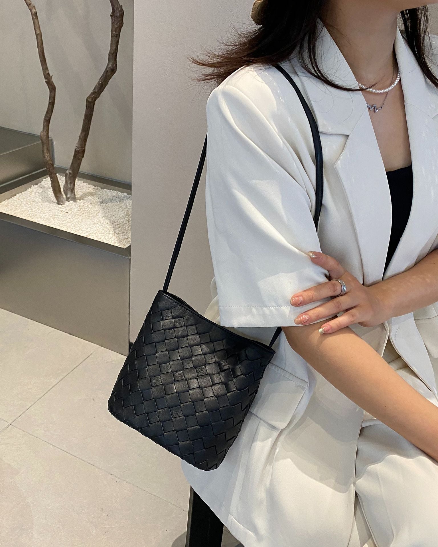 Cuir véritable tissé petit sac