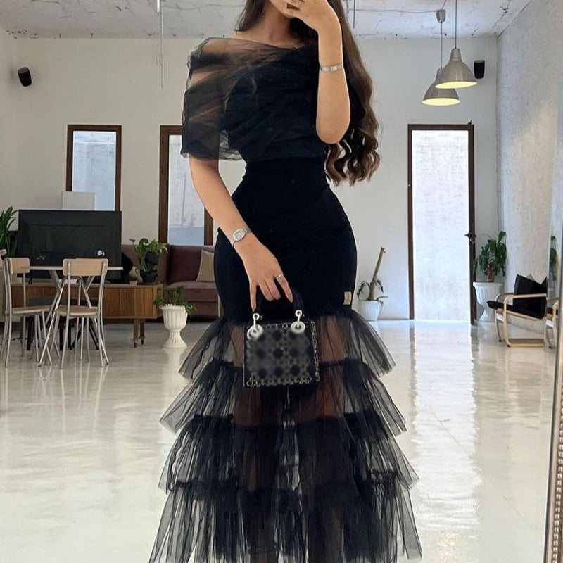 Robe longue avec lambris en mesh et un style de soirée sans sangle