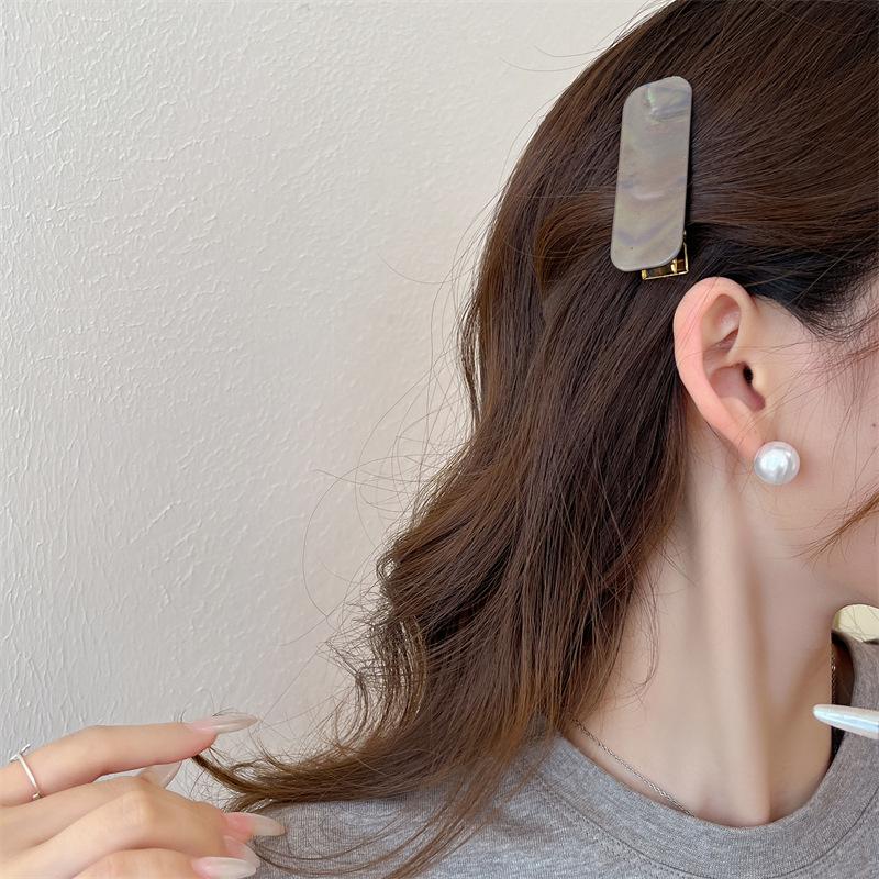Clip latéral simple Clip à cheveux sur Internet