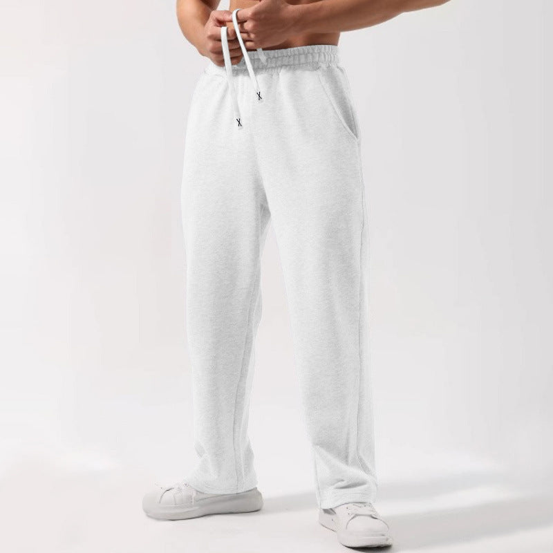 Sweatpants à cordons élastiques de couleur solide mâle