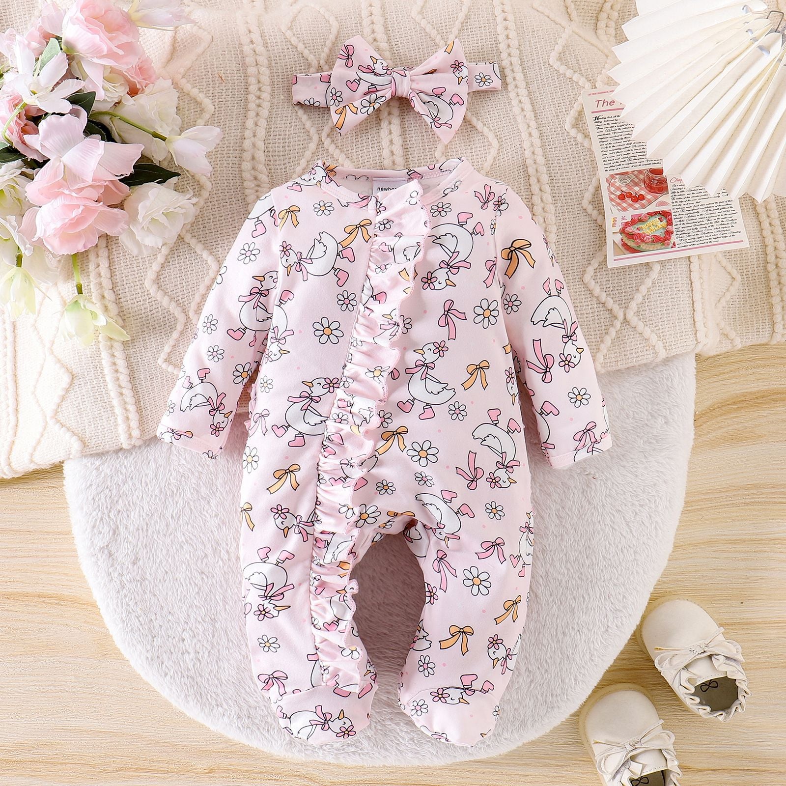 Mignon bébé fille à manches longues Combinaison avec une petite impression de canard