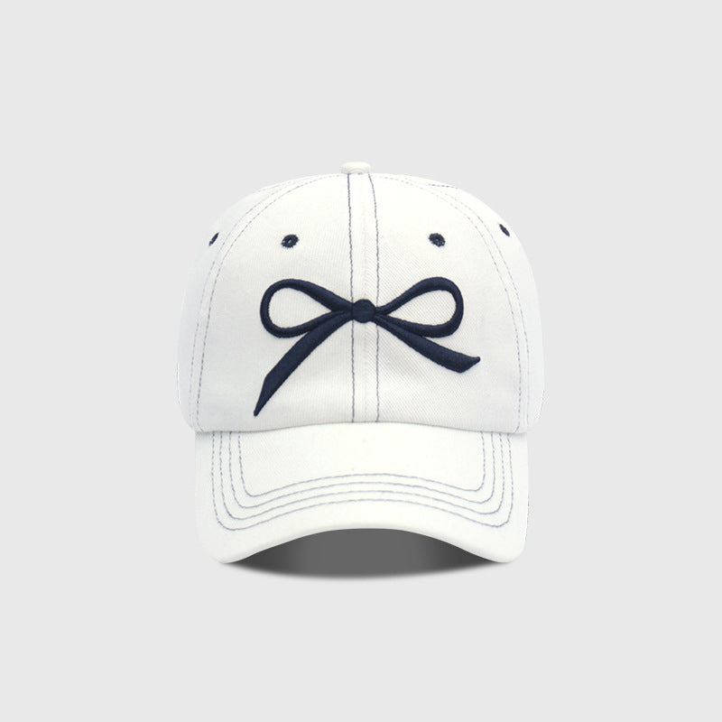 Le cap de baseball souple de la Dame est adapté pour O