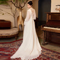 Robe de mariée vintage en dentelle de style français avec manches de puff