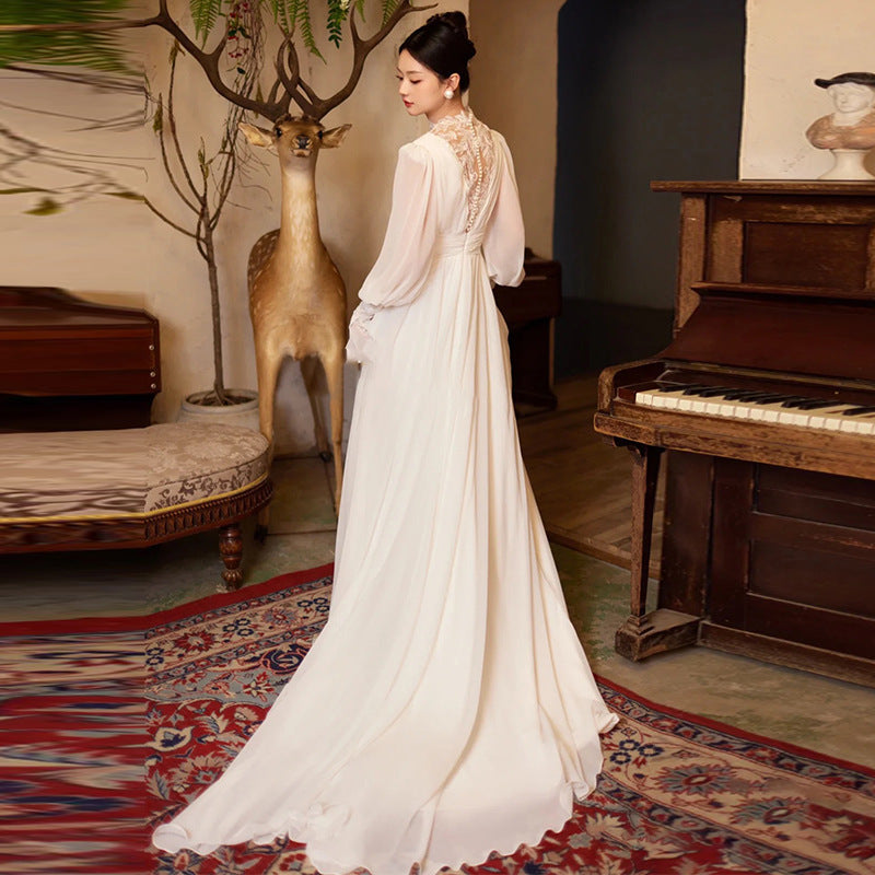 Robe de mariée vintage en dentelle de style français avec manches de puff