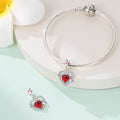 Bracelet bricolage avec perles roses en forme de cœur et accessoires pendentif