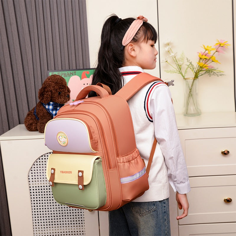 L'école primaire Le fardeau des étudiants Relief Spine Protection Schoolbag Multi-compartment Scratch-