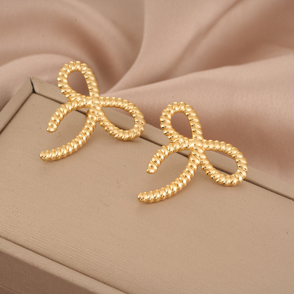 Boucles d'oreilles européennes et américaines tendance Chanel-Style Bowknot pour les femmes