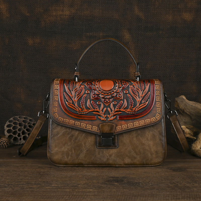 Sac à main artisanal avec une bande transversale et un design de bloc de couleur