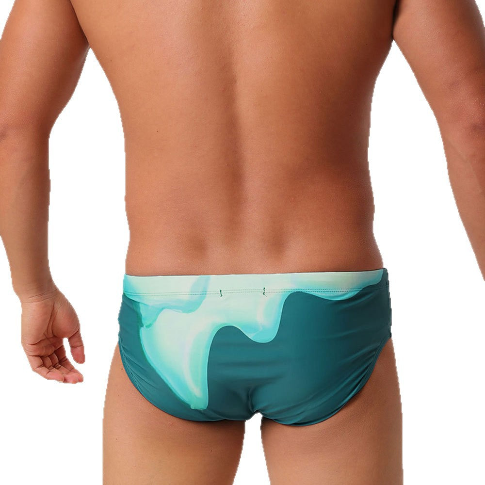 Gradient flowing-print Triangle Swim Trunks Modeable
