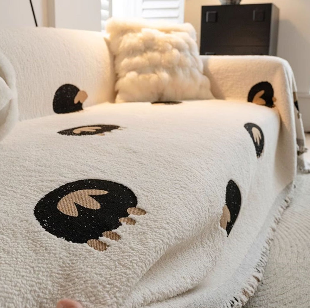 Couverture de canapé d'une pièce qui couvre entièrement le canapé