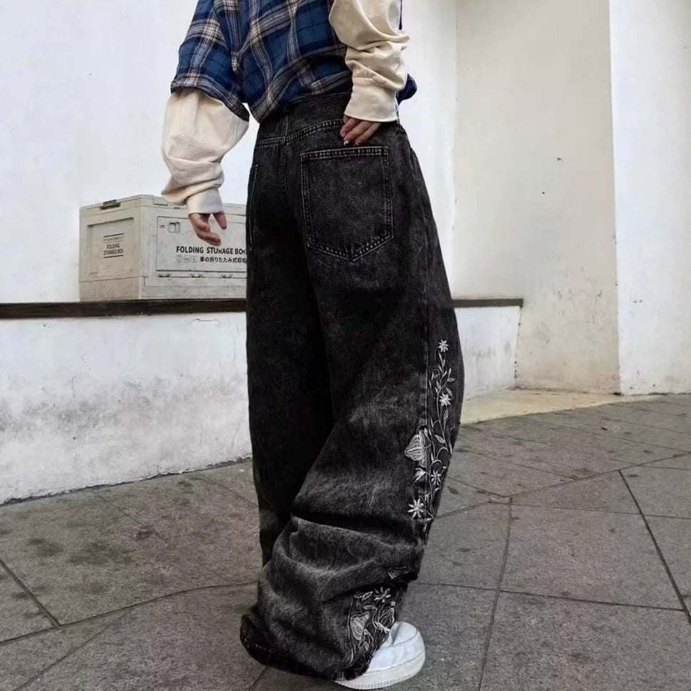 Pantalons de denim à jambes larges brodés à haute hauteur