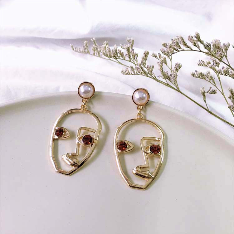 Boucles d'oreilles en perles de la personnalité du visage coréen